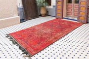 Vintage moroccan rug from Beni mguild, berber handmade area rug - sustainably made MOMO NEW YORK sustainable clothing, rug slow fashion